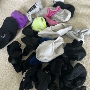 Assortment of old used ankle socks